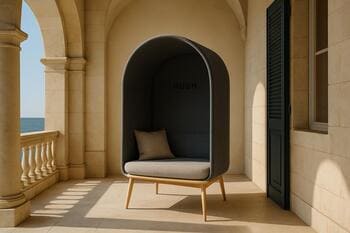 Quiet bench with a book open, hedge beyond